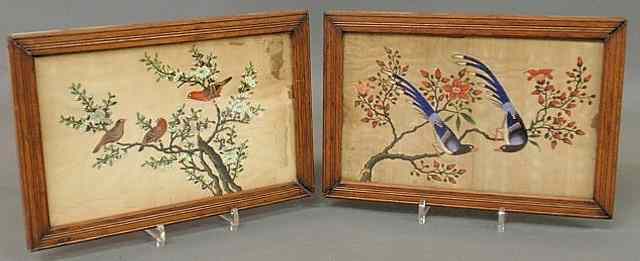 Appraisal: Pair of oak framed colorful bird paintings on silk c