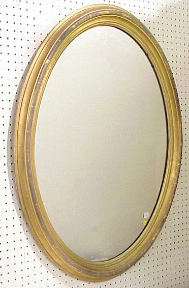 Appraisal: Gilt oval molded frame mirror h x w