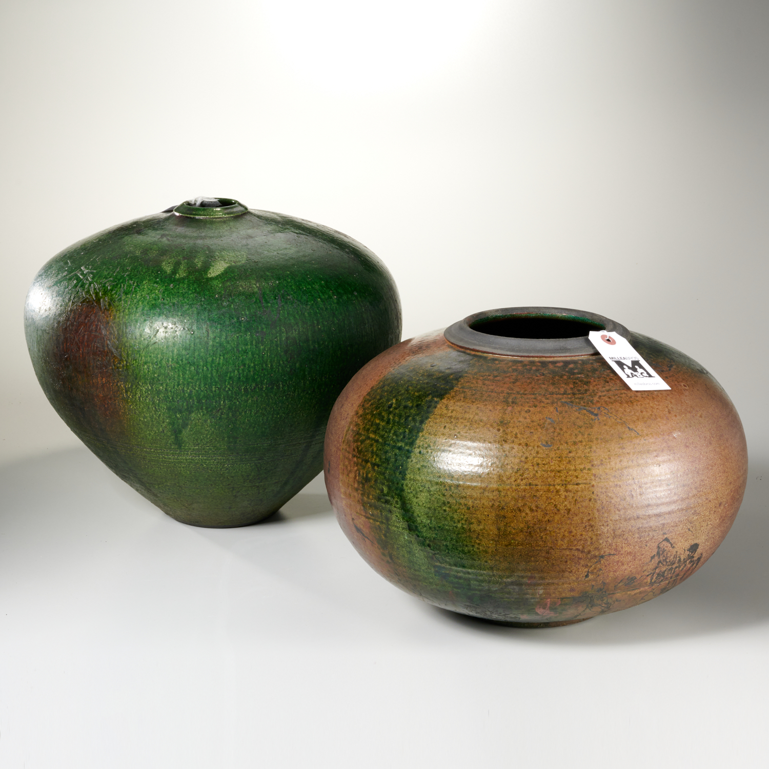 Appraisal: SIGNED MODERNIST STUDIO ART POTTERY VASES c each in brown