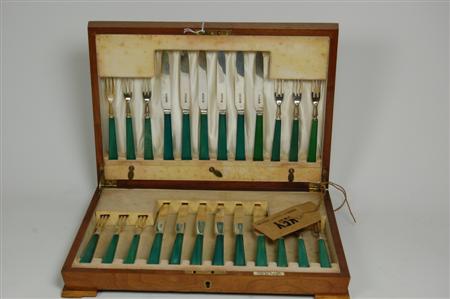 Appraisal: A cased set of twelve pairs of fruit knives and