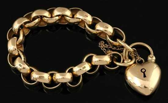 Appraisal: A gold padlock bracelet The belcher link chain in ct