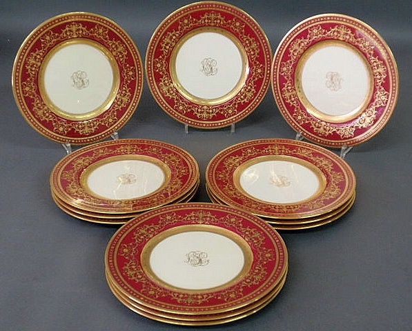 Appraisal: Set of twelve Minton service plates with maroon borders and