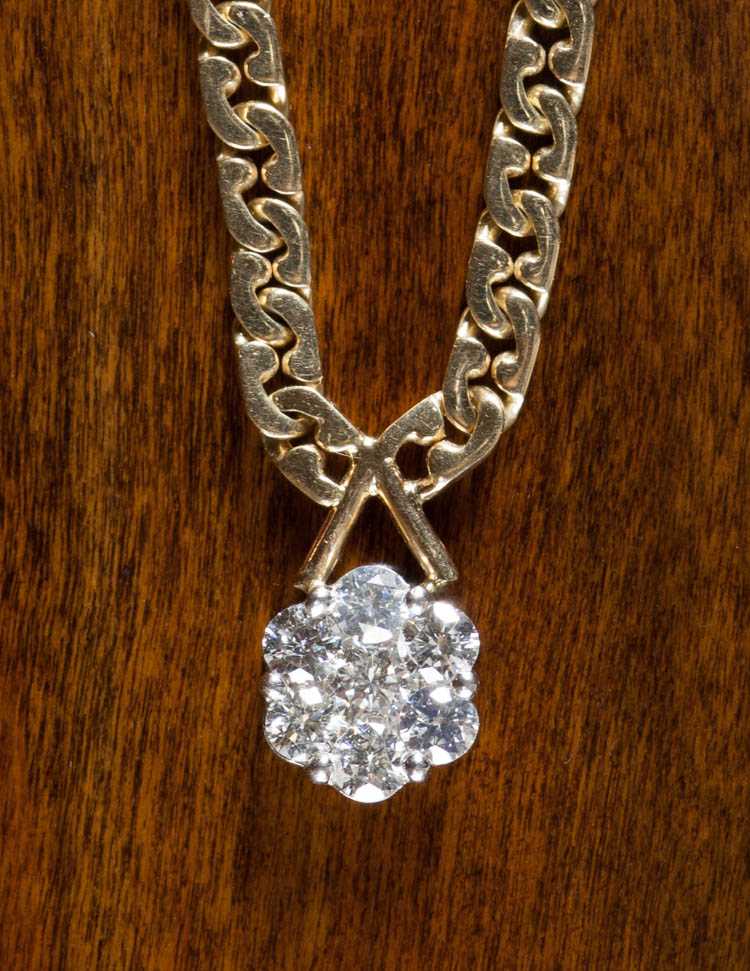 Appraisal: DIAMOND AND FOURTEEN KARAT GOLD NECKLACE Secured between to lengths