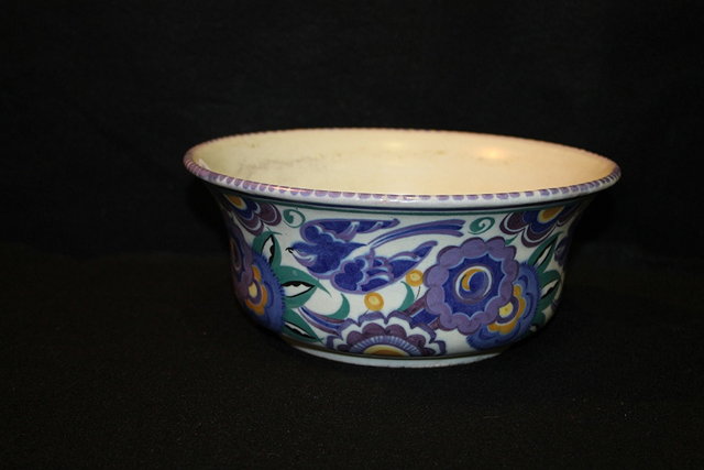 Appraisal: A CARTER STABLER AND ADAMS POOLE POTTERY 'BLUE BIRD' BOWL