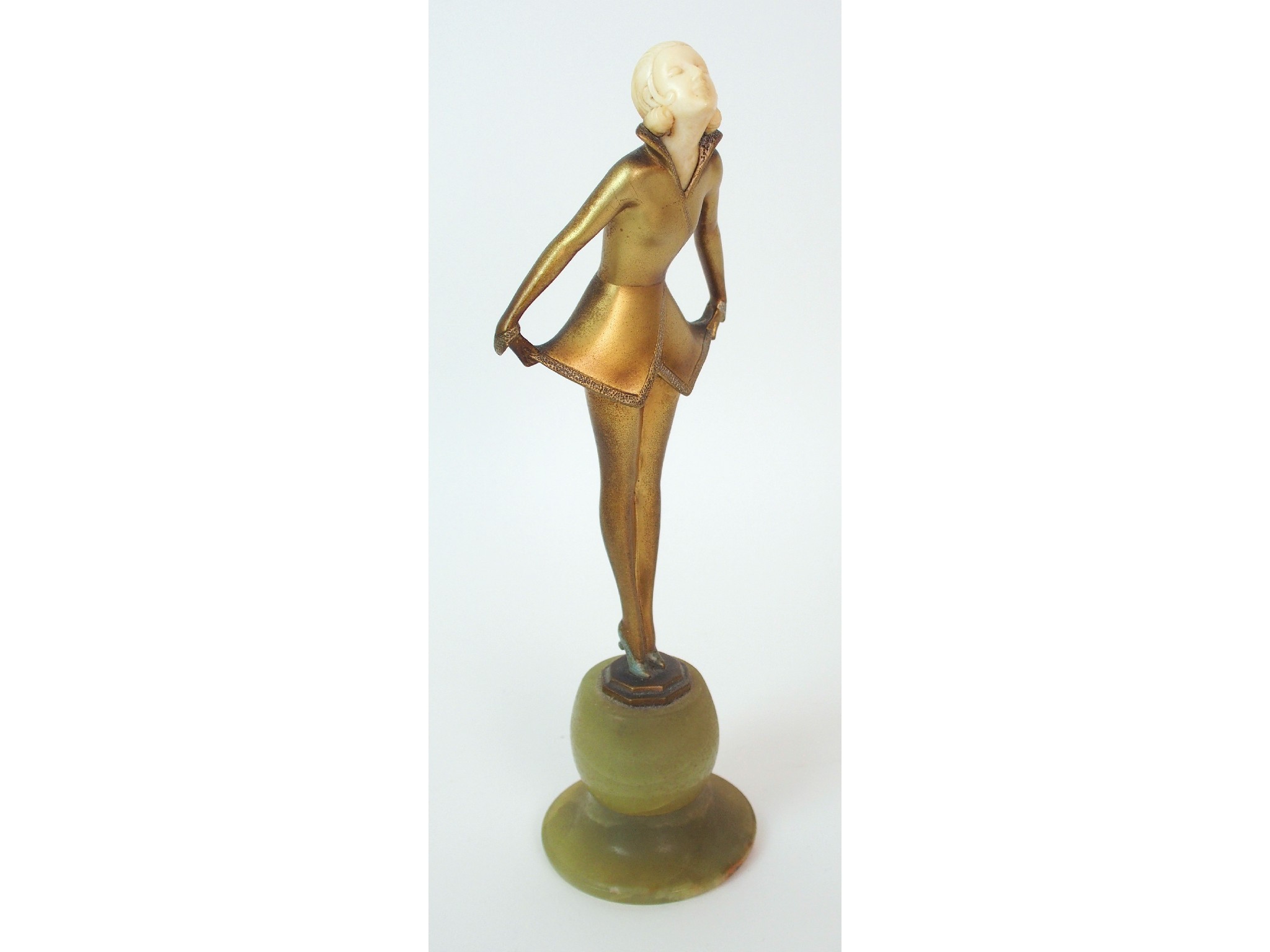 Appraisal: An Austrian Art Deco gilt bronze and ivory figure by