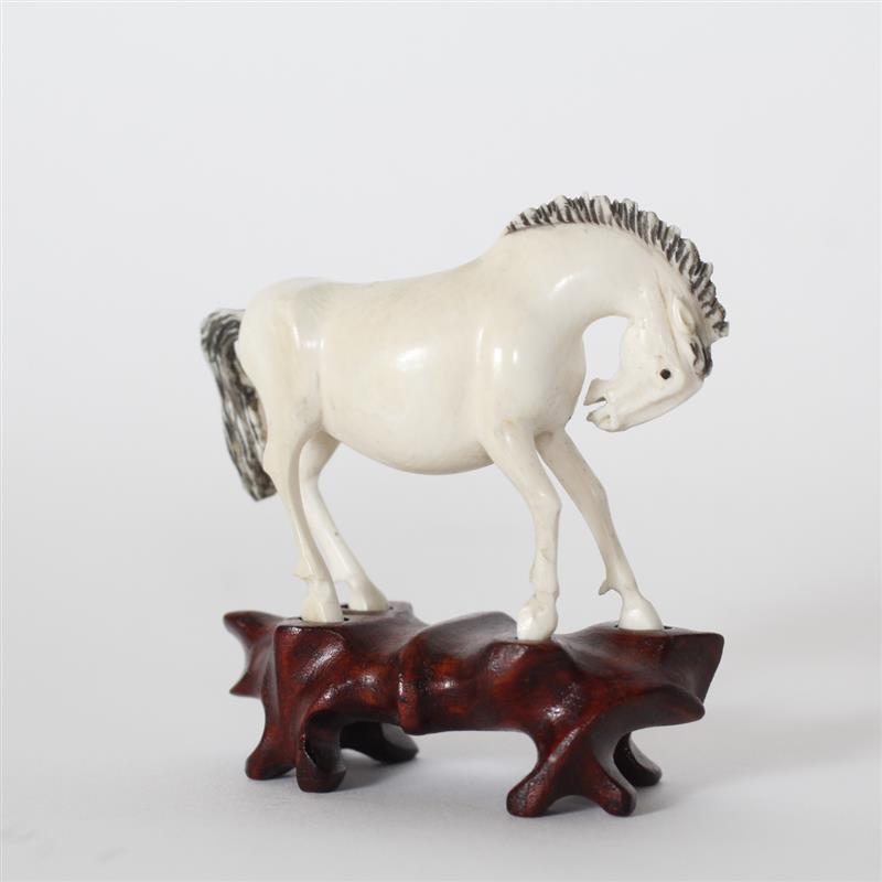 Appraisal: Chinese carved ivory miniature horse figure on stand H x