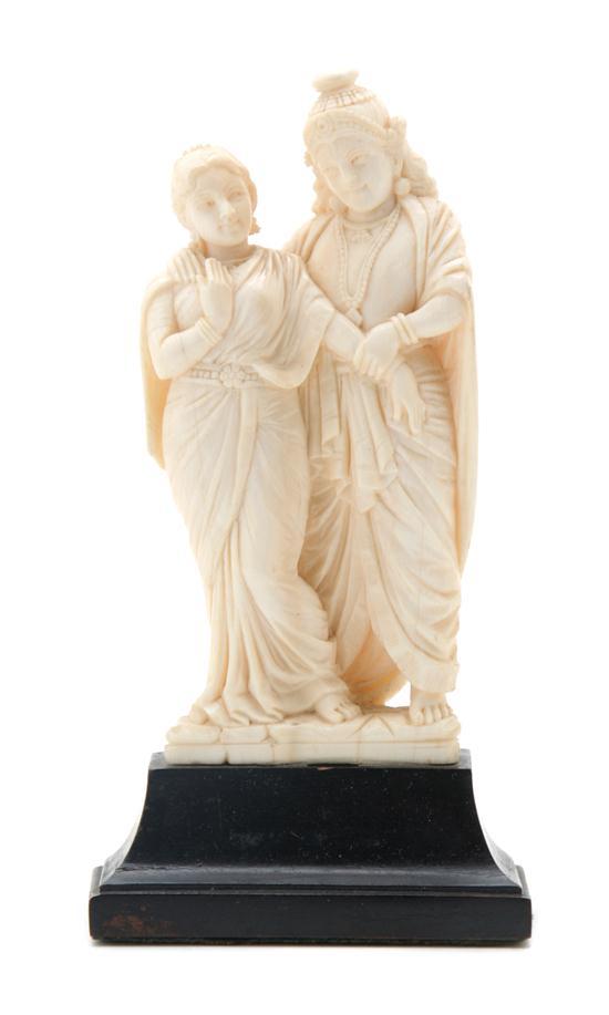 Appraisal: n Indian Ivory Carving of Two Figures shown in flowing