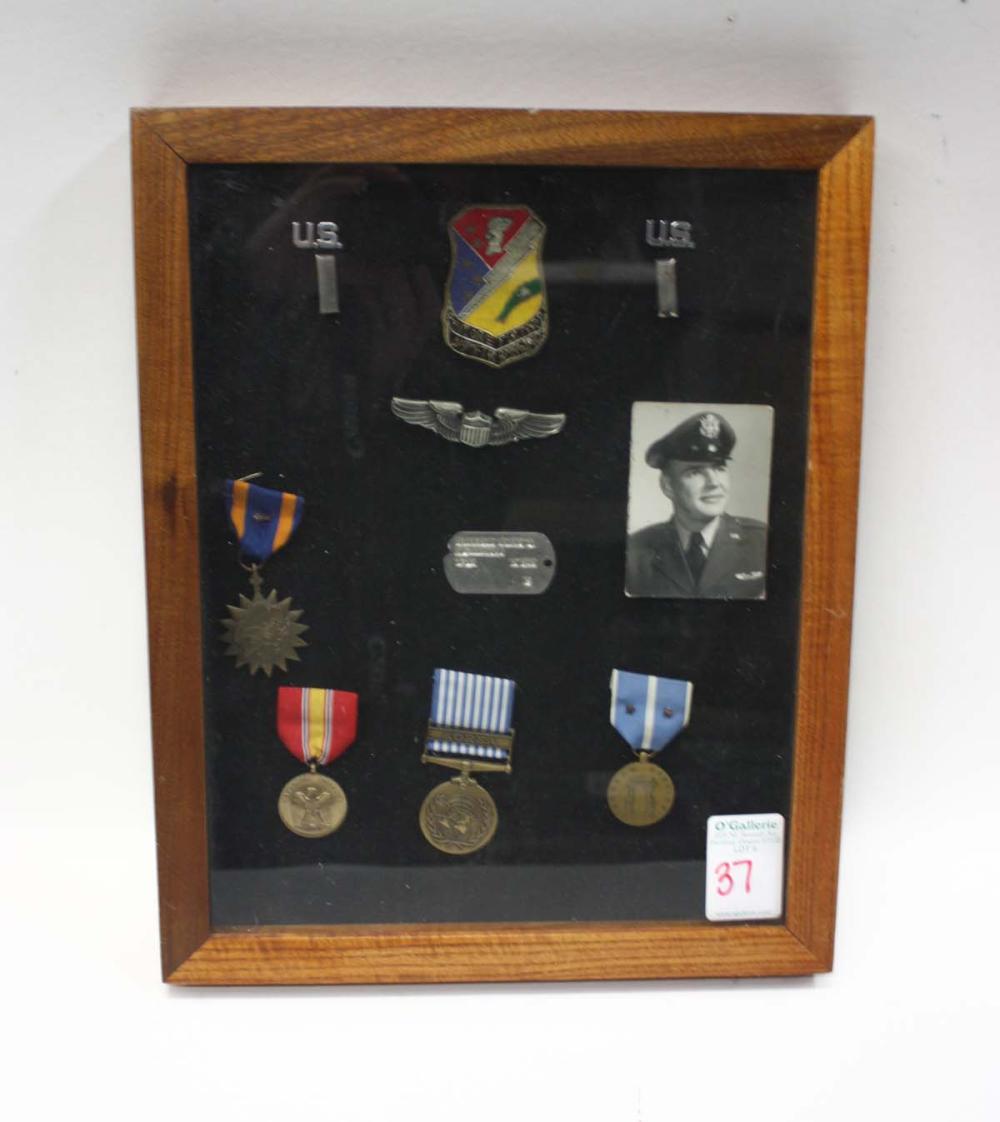 Appraisal: FRAME OF KOREAN WAR MEMORABILIA including USAF sterling pilot wings