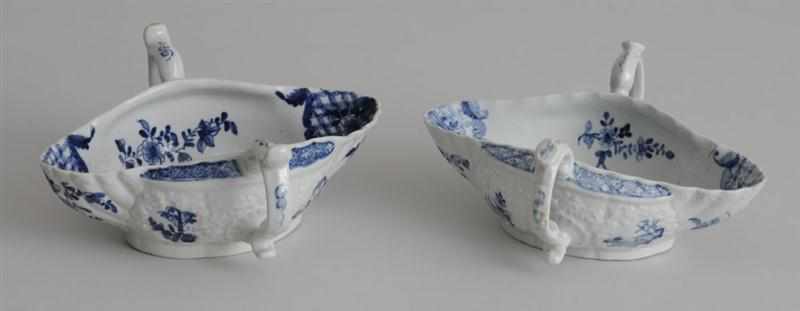 Appraisal: TWO SIMILAR ENGLISH BLUE AND WHITE PORCELAIN TWO-HANDLED DOUBLE-SPOUTED SAUCE