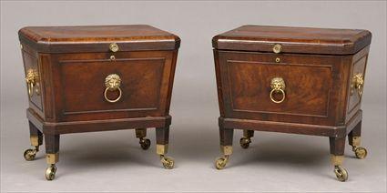 Appraisal: PAIR OF REGENCY INLAID MAHOGANY CELLERETS Each cross-banded hinged lid