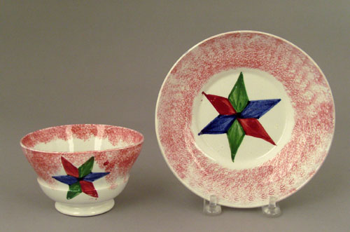 Appraisal: Red spatter cup and saucer th c with blue green