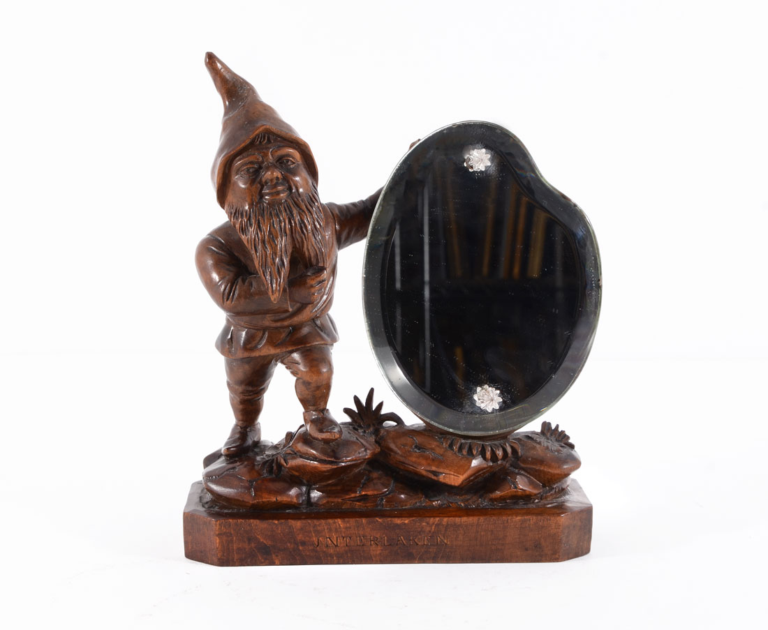 Appraisal: CARVED BLACK FOREST FIGURAL GNOME MIRROR Late th to early