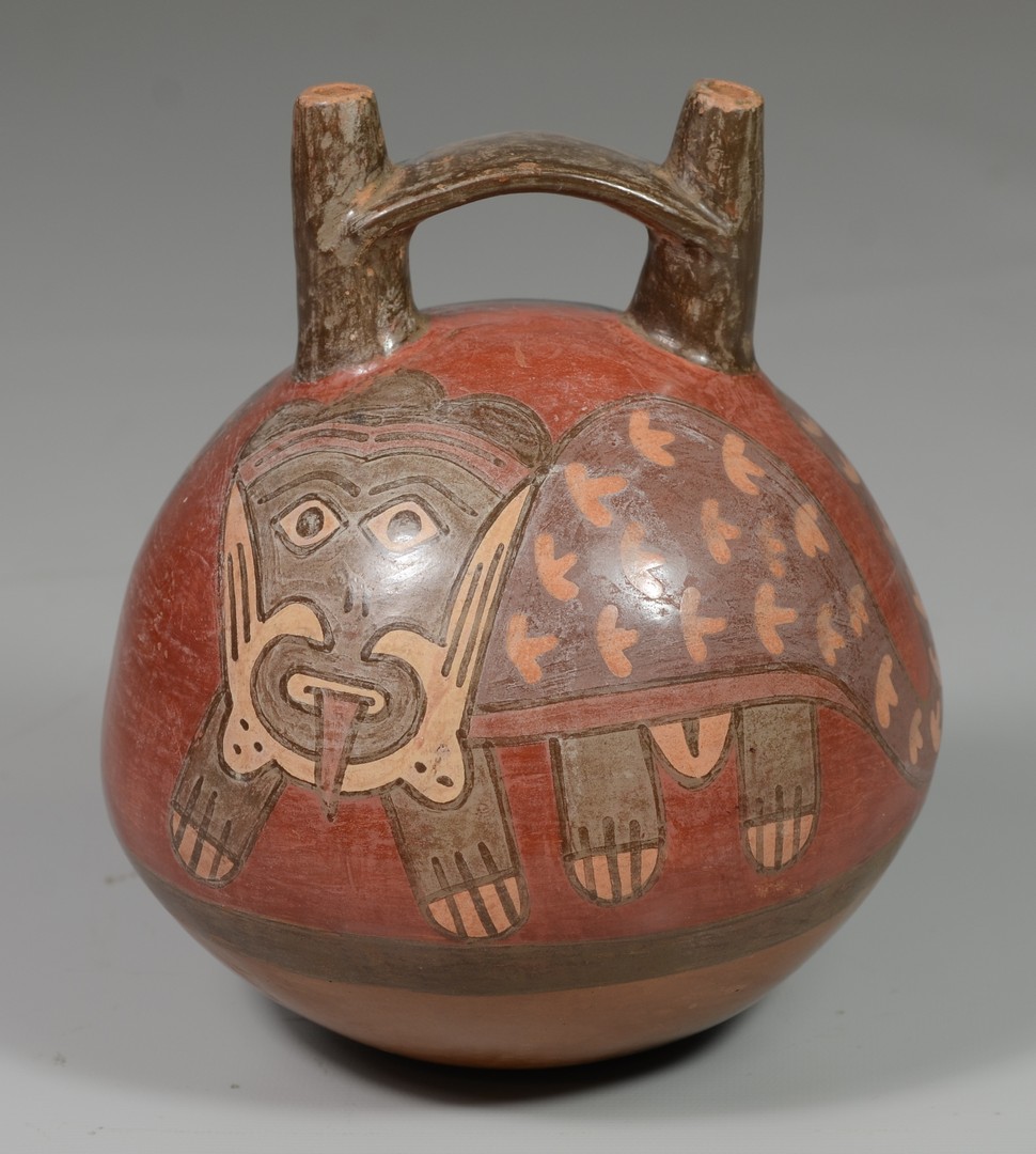 Appraisal: Peruvian Huaco Stirrup-spout Bottle with mythical animal decoration nd rd