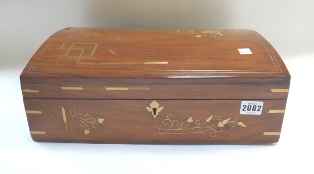 Appraisal: A modern hardwood and brass inlaid domed casket jewellery box