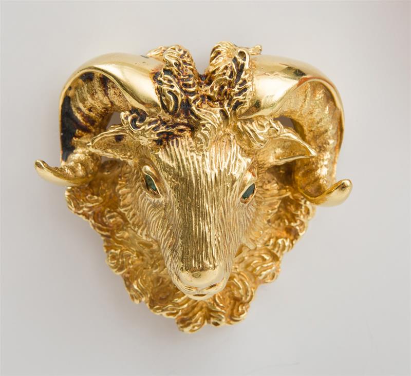 Appraisal: K YELLOW GOLD RAM'S HEAD PIN With emerald eyes stamped