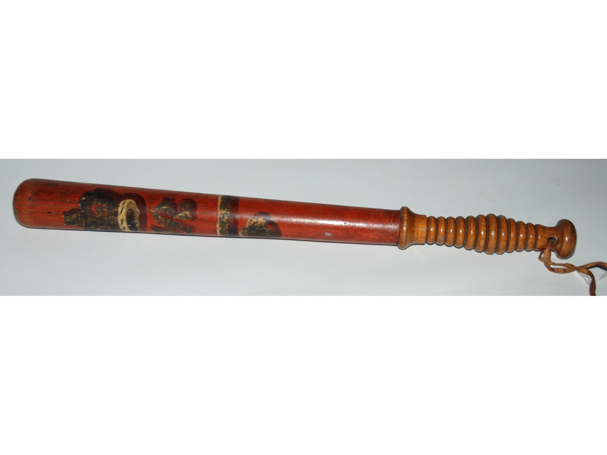 Appraisal: A painted hardwood truncheon