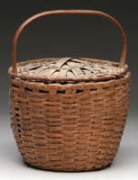 Appraisal: COVERED SINGLE HANDLED SPLINT BASKET The handle goes through edges