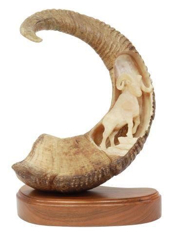 Appraisal: Ram sheep horn carved at the interior of one side