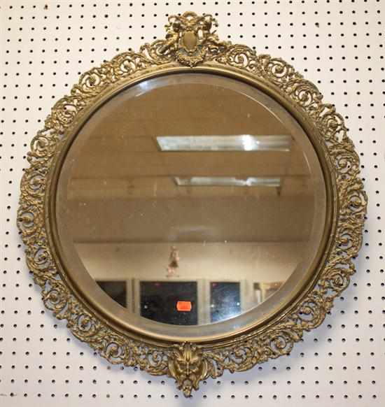 Appraisal: Continental brass mirror with putti and satyr face mask Estimate