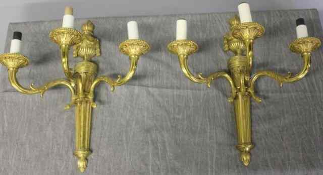 Appraisal: Pair of Bronze Classical Arm Sconces Nice quality with swags