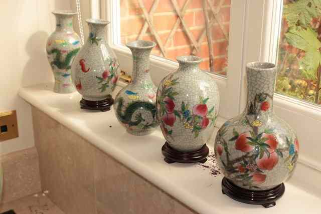 Appraisal: A GROUP OF FIVE CHINESE CRACKLE GLAZED BOTTLE VASES three