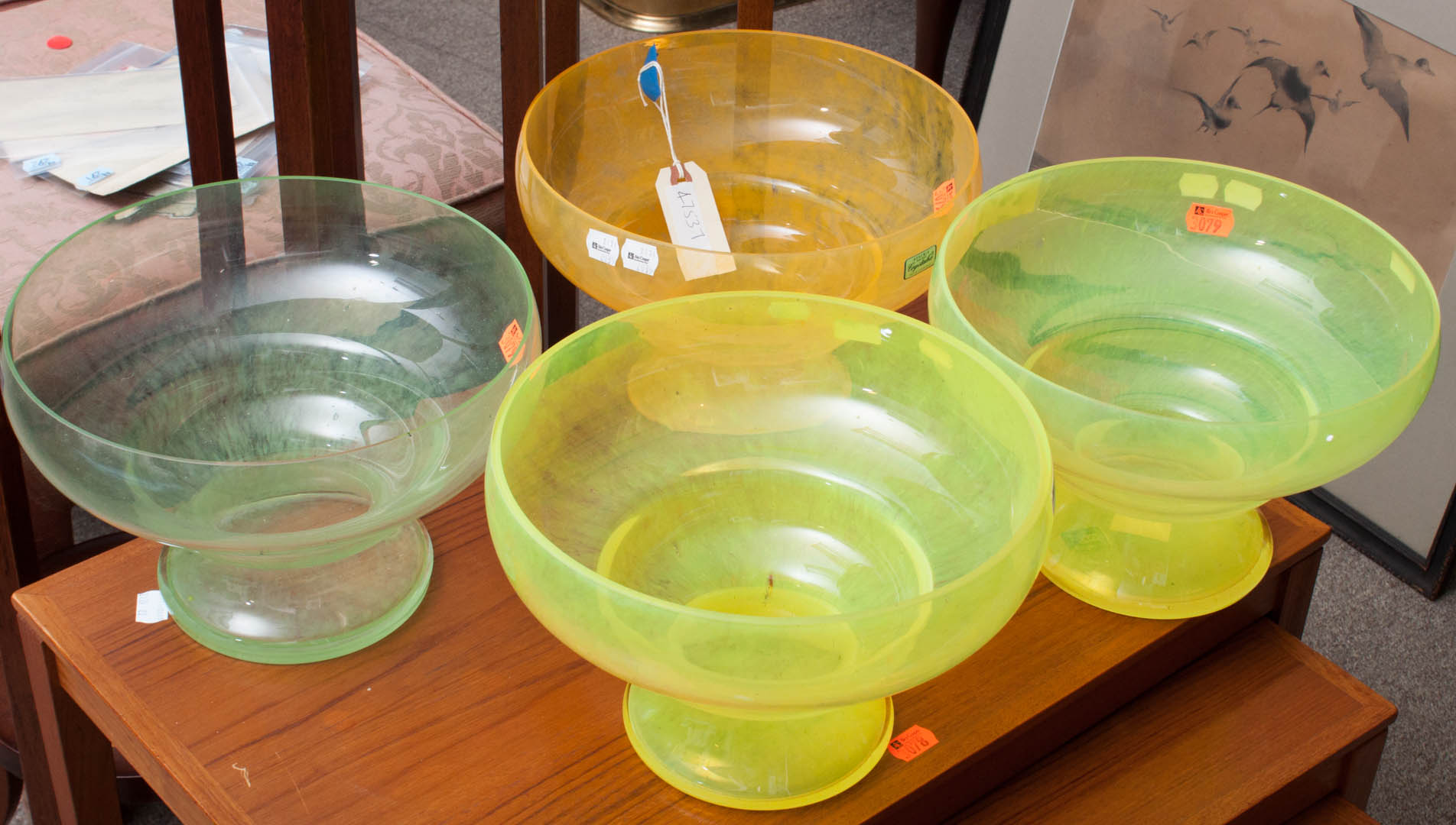 Appraisal: Four Bohemian colored glass bowls