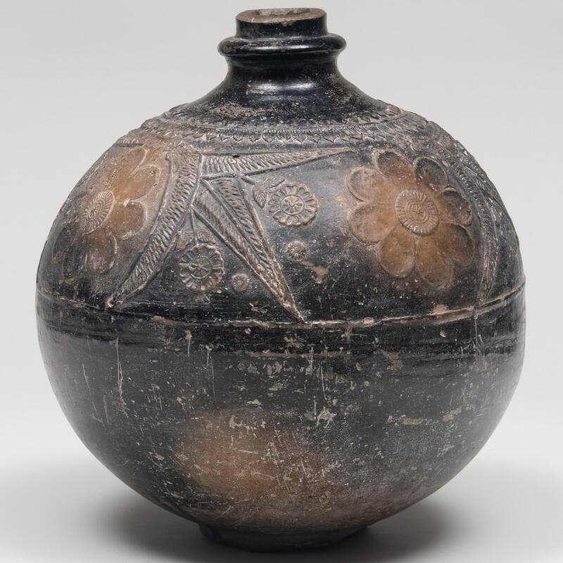 Appraisal: Asian Black Glazed Earthenware Jar Unmarked x in diam Condition