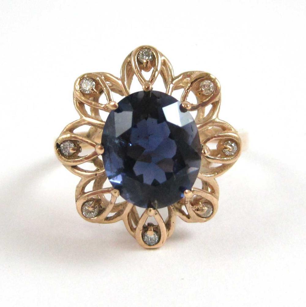 Appraisal: IOLITE DIAMOND AND FOURTEEN KARAT GOLD RING with eight round-cut