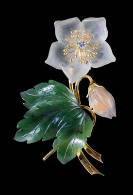 Appraisal: Carved jade and quartz flower brooch clear quartz flower accented