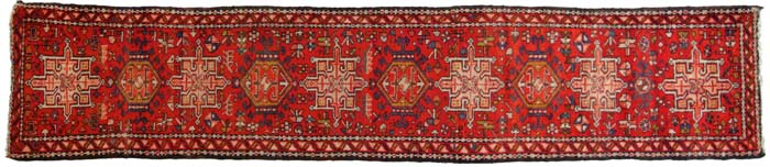 Appraisal: HAMADAN ORIENTAL RUNNER Ten medallion on a red field multiple