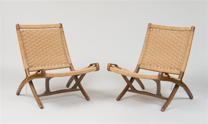 Appraisal: Pair of Folding Chairs in the Style of Hans Wegner