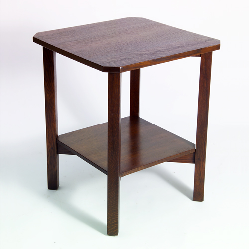 Appraisal: GUSTAV STICKLEY Square lamp table with clipped corners and lower