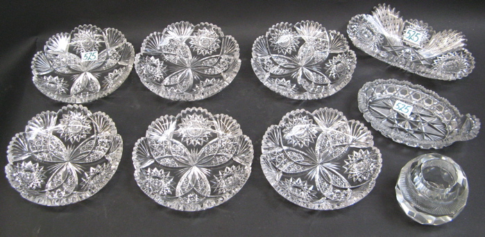 Appraisal: NINE CLEAR CUT CRYSTAL TABLE ACCESSORIES American Brilliant cut round