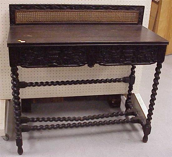 Appraisal: Baroque style table quarter sawn oak dark finish caned backsplash