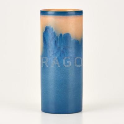 Appraisal: SALLIE E COYNE ROOKWOOD Vellum cylindrical vase with conifers Cincinnati