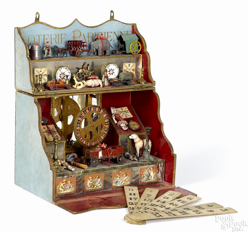 Appraisal: French Loterie Parisienne parlor toy with a gaming wheel and