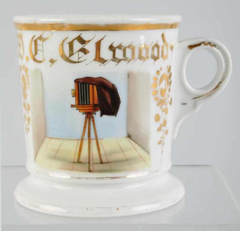 Appraisal: Photographer Shaving Mug Description Gilt name M C Elwood Shows