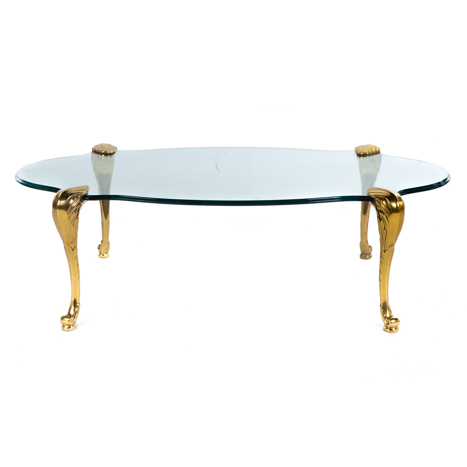 Appraisal: CONTEMPORARY BRASS GLASS COCKTAIL TABLE Scalloped edge with glass top