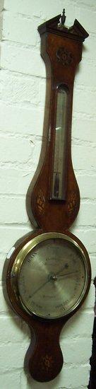 Appraisal: A th Century mahogany and inlaid wheel barometer the silvered