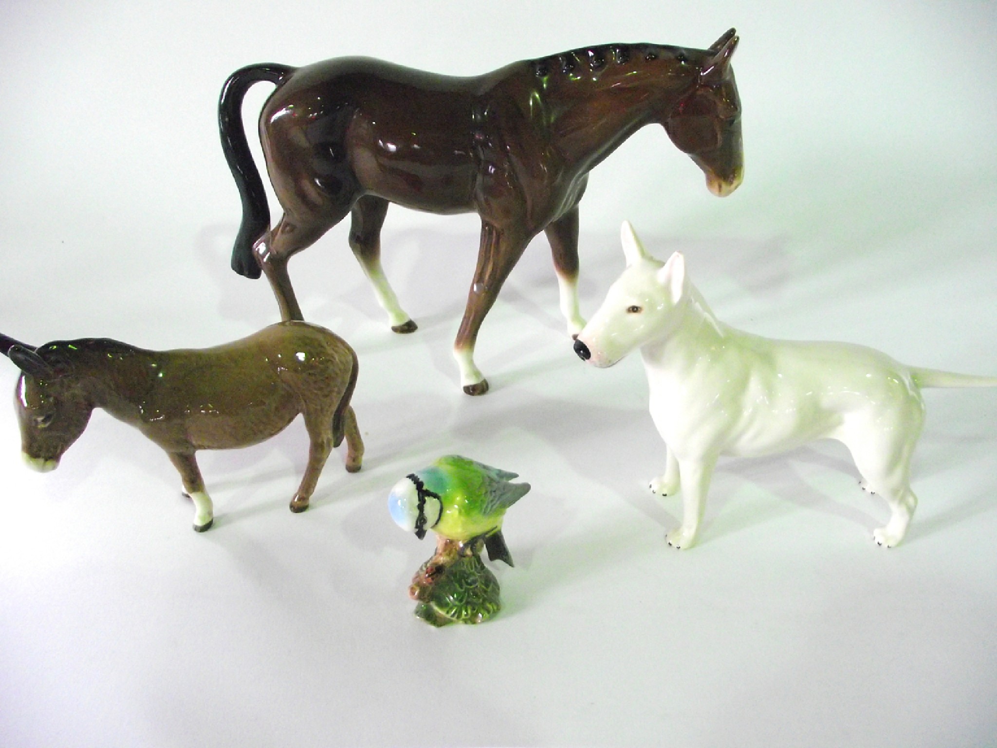 Appraisal: Three Beswick models comprising a Staffordshire Bull Terrier marked to