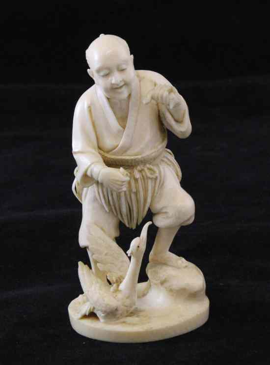 Appraisal: A Japanese ivory figure of a cormorant fisherman early th