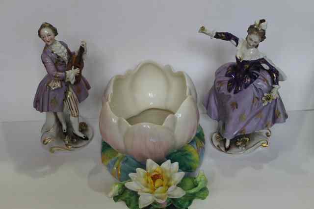 Appraisal: A CLARICE CLIFF FLOWER HOLDER in the form of a