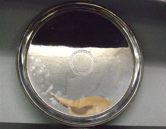 Appraisal: Modern silver circular salver with beaded borders on four scroll