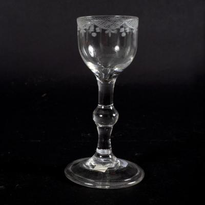 Appraisal: An th Century cordial glass with knopped stem on a