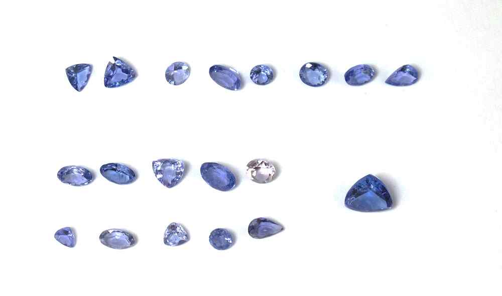 Appraisal: APPROX TANZANITE GEM STONES The largest being a Ct triangle