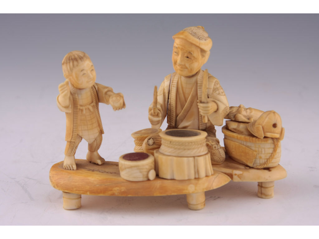 Appraisal: Antique Japanese Bone and Ivory Okimono a charming genre scene