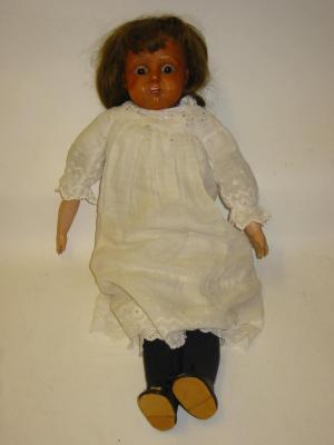 Appraisal: A Kestner shoulder head celluloid girl doll with brown glass