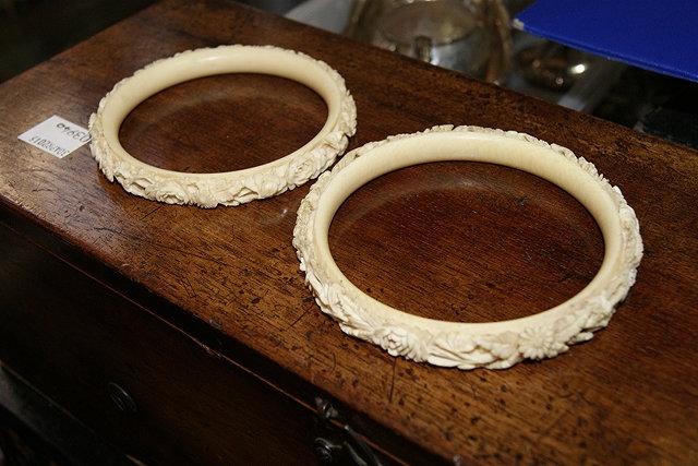 Appraisal: Pair of carved ivory Canton banglescirca