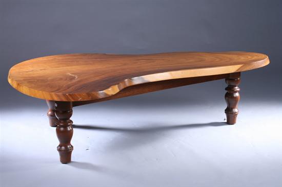 Appraisal: CONTEMPORARY WALNUT LOW TABLE mid th century Free-form with shaped