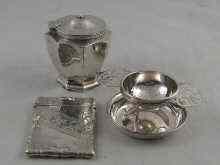 Appraisal: An Edwardian silver tea caddy with fluted vase shaped body